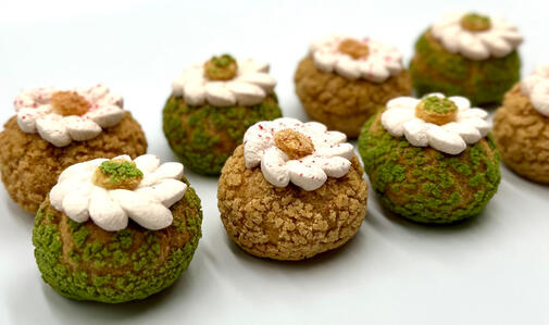 With light pistachio pastry cream and raspberry coulis